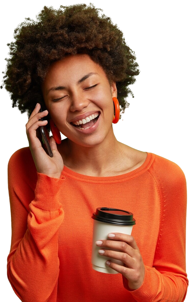 portrait-funny-woman-with-curly-hair-laughs-happily-has-phone-conversation-being-amused-by-friend-drinks-coffee-from-disposable-cup-dressed-casually-closes-eyes